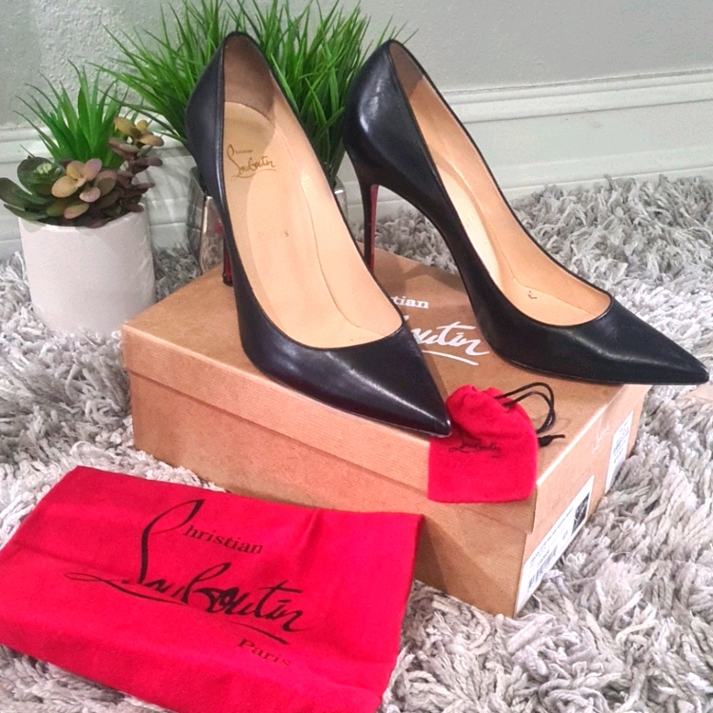 Christian Louboutin , black pumps